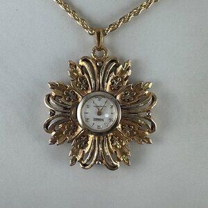 Vintage Norbee Elegant gold women's watch with an ornate Sculptured design 24 in